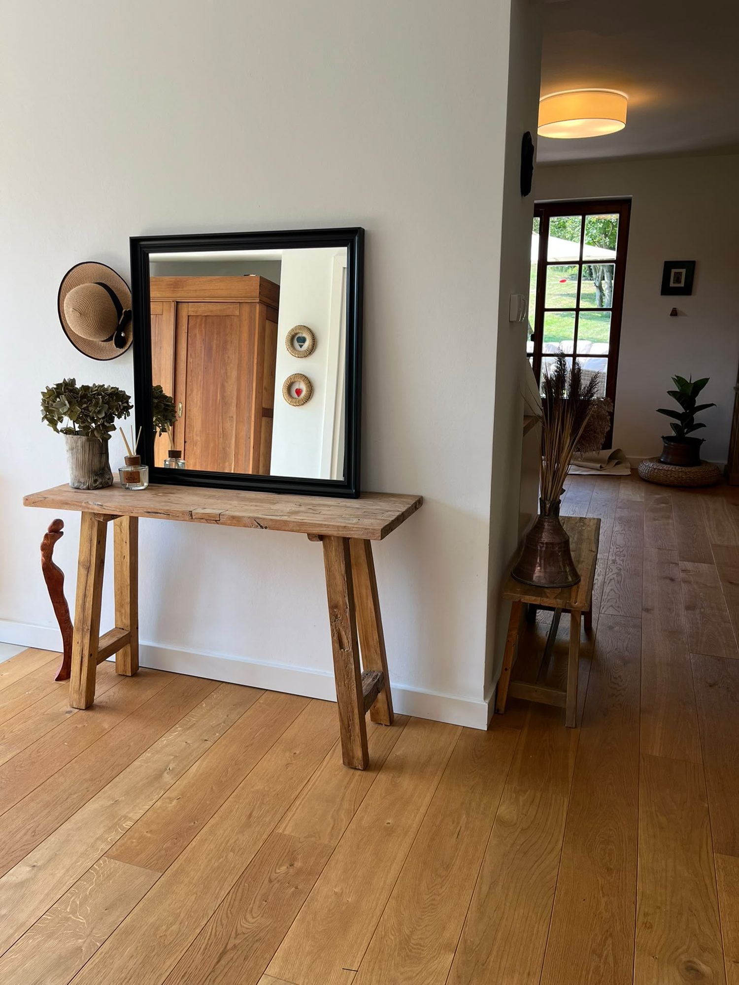 Mirror and console by the entrance