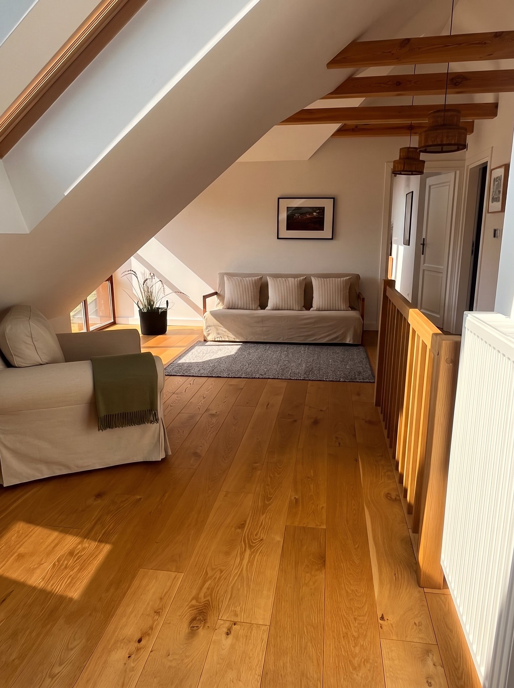 Long upstairs lounge beneath the beams